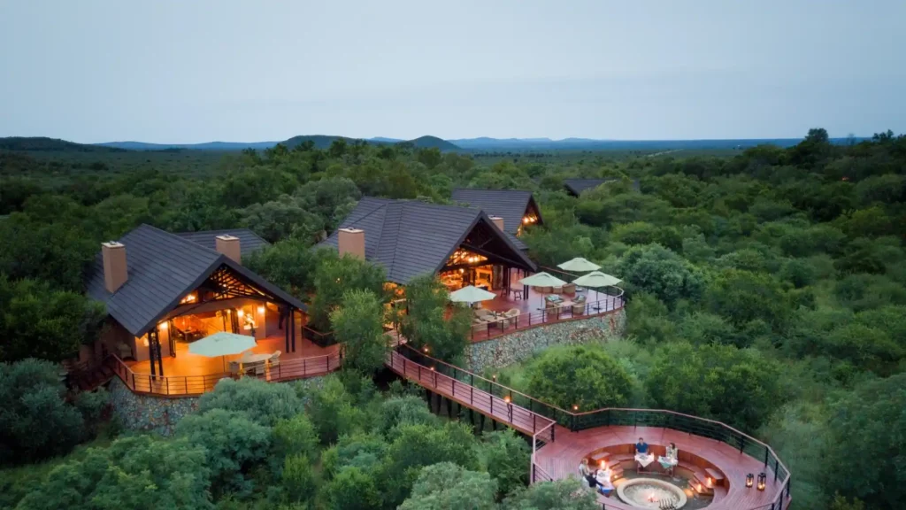 Aerial view of luxury safari lodge surrounded by African bushveld